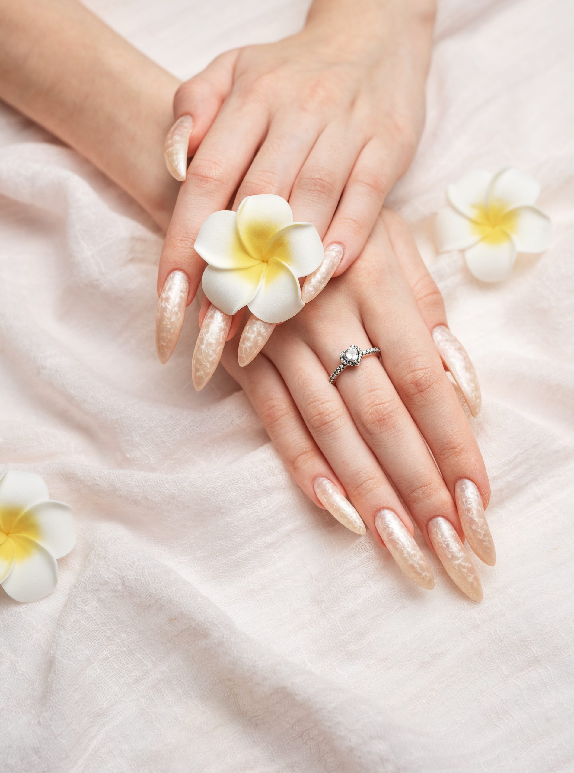 Pearl manicure with flowers